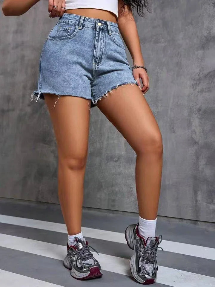 High-waisted distressed denim shorts